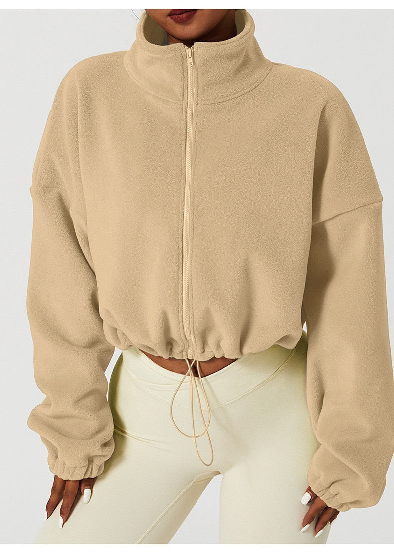 Stay warm without sacrificing style in our Winter Fleece-Lined Sports Jacket, designed with a cozy fleece lining and relaxed fit for chilly days. Perfect for workouts, outdoor adventures, or everyday wear.