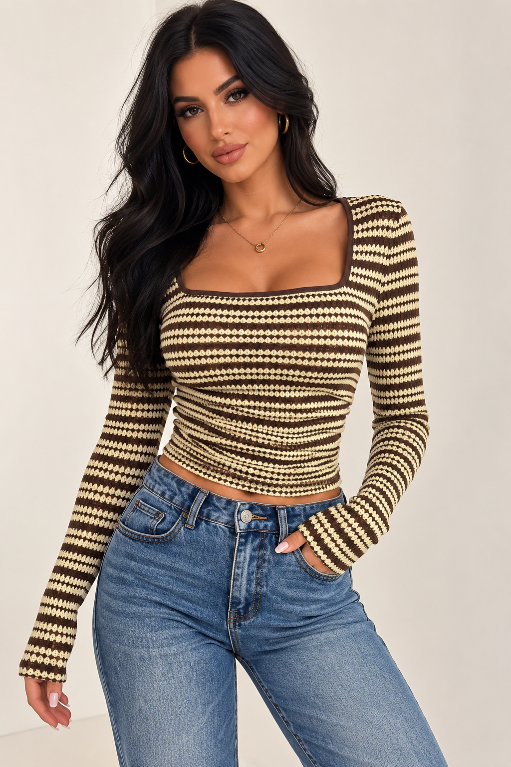 Add a chic touch to your wardrobe with this fitted striped knit top, featuring a flattering square neckline and comfortable long sleeves. Pair it with jeans for a casual everyday look or dress it up with trousers, a skirt, and heels for a night out.